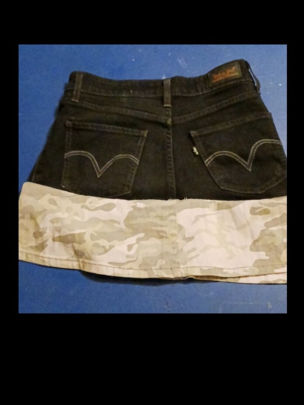 Levi's Black Denim Skirt.Black demin skirt with Diy camo hem.